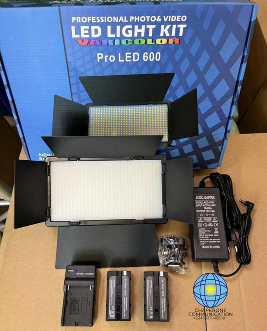 LED light kit with accessories on a table, including a blue box labeled 'Pro LED 600'.